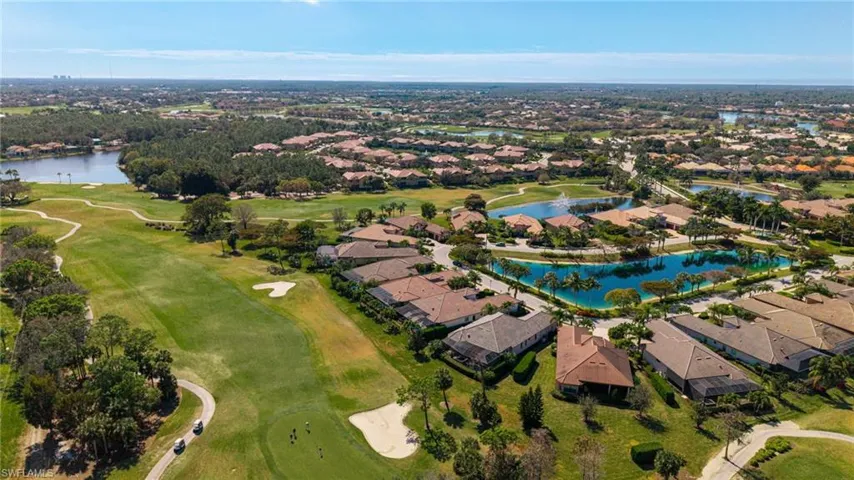 View of property location featuring nearby suburban area and a nearby body of water