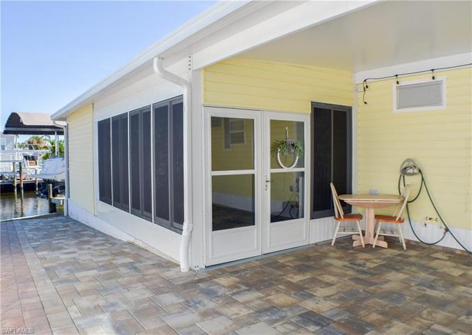 Screen Lanai and entrance off carport