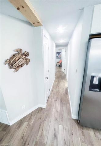 Hall to bedroom and bathrooms
