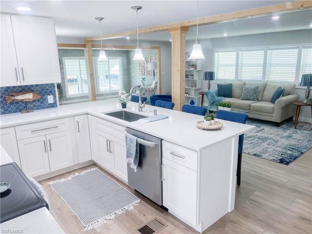 New kitchen with open concept living area