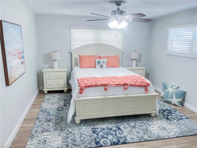 Primary bedroom with en-suite bath and walk-in closet