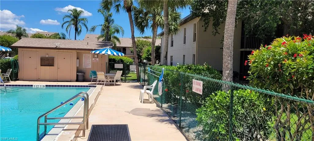 View of swimming pool with a patio