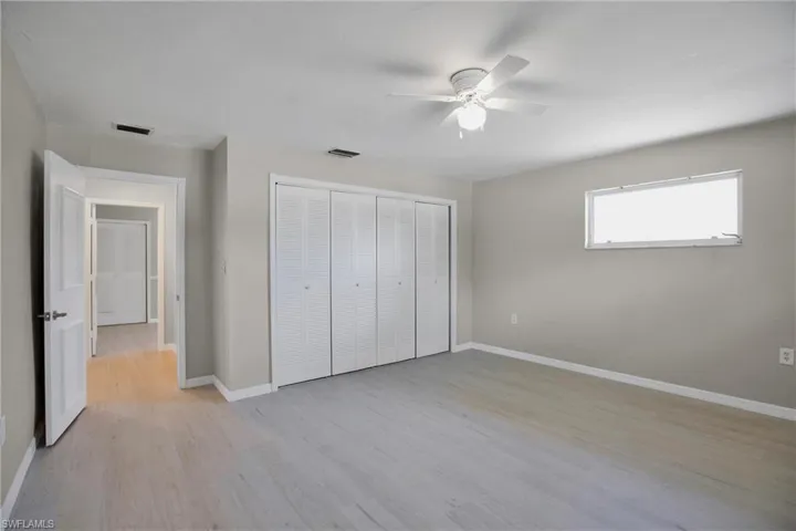 3rd Bedroom featuring ceiling fan, light hardwood / wood-style flooring, and a closet