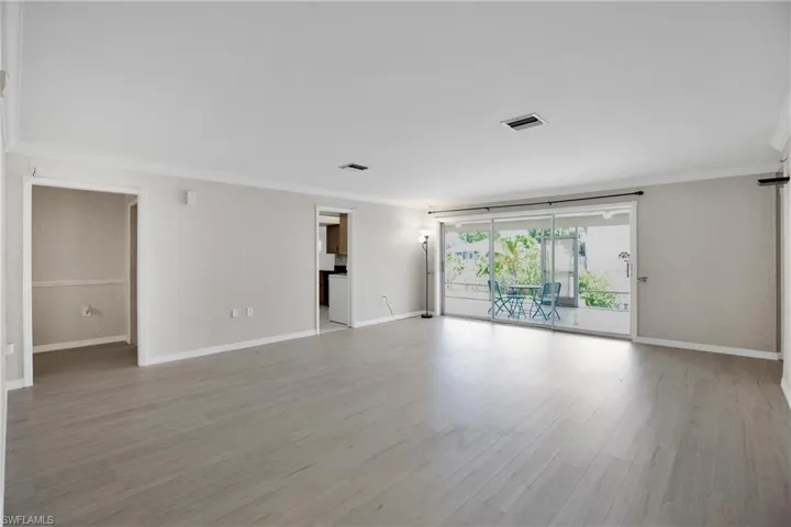 Living room looking towards Entry, Kitchen and Lanai