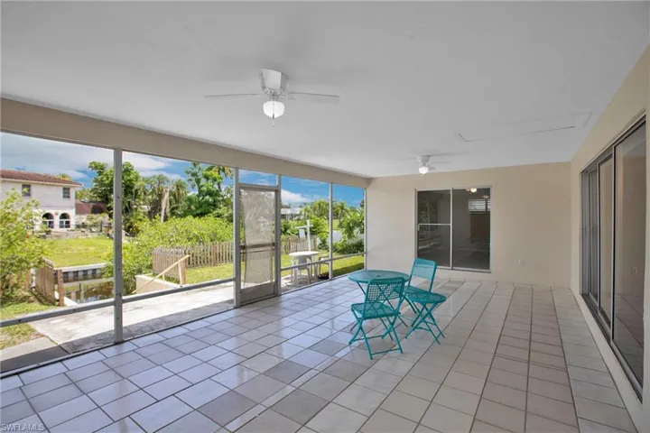 sunroom / Lanai with ceiling fans