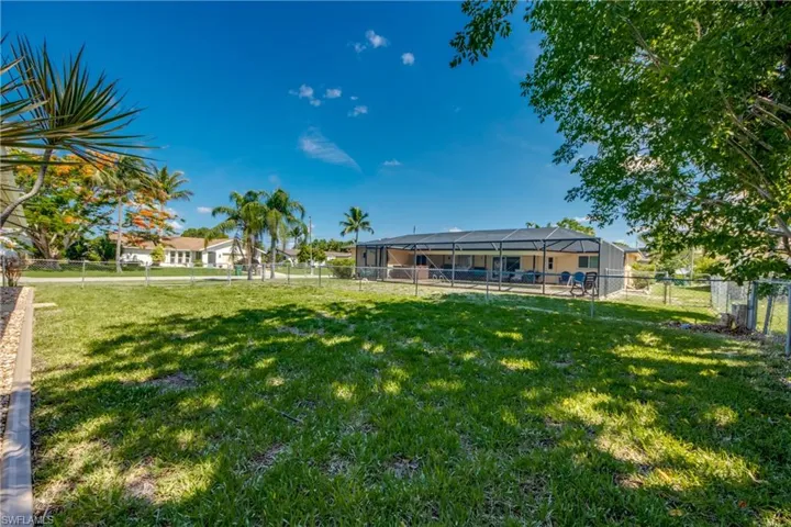View of fenced backyard