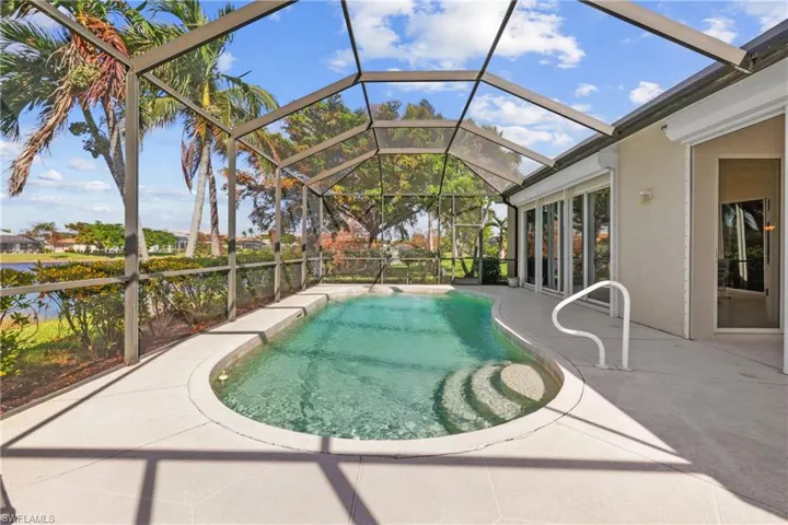 Enjoy your wonderful pool with sunset views. Newer pool cage.