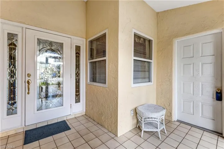 Front door entrance and garage door entrance