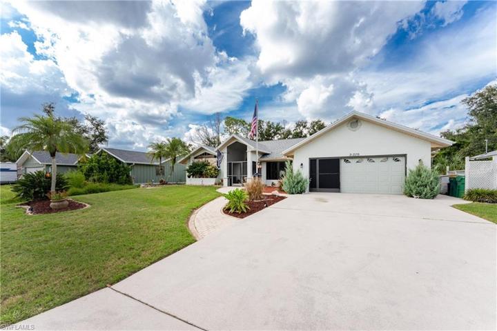 Large Driveway with privacy screen garage