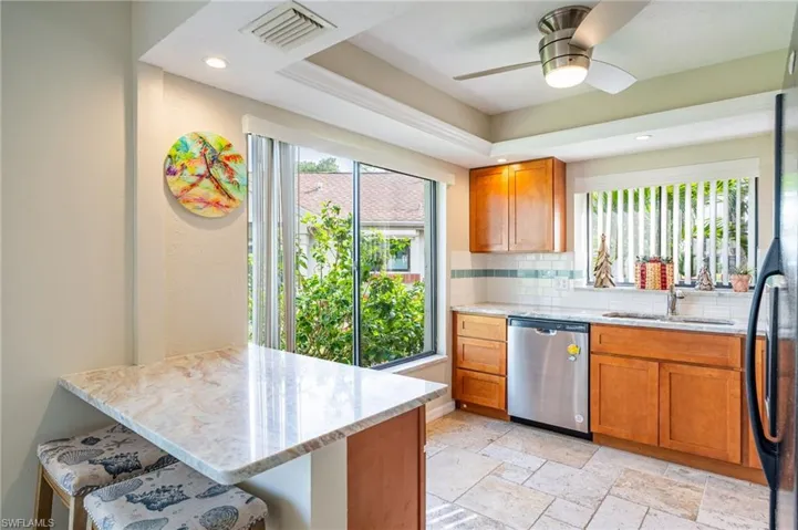 Breakfast Bar in Kitchenw/Granite Counter Tops