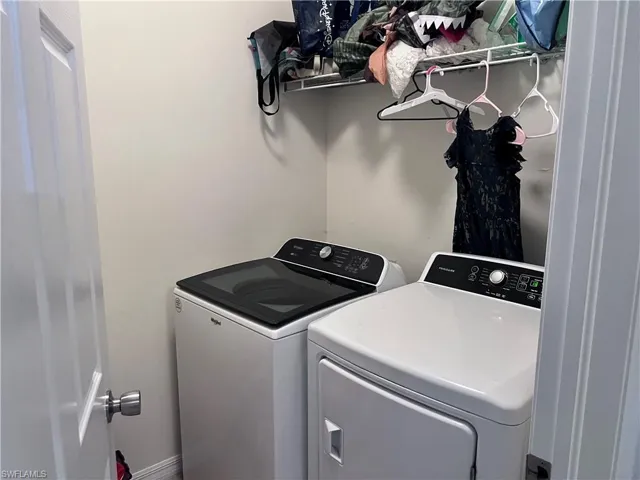 Laundry room with separate washer and dryer