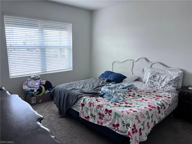 Bedroom with carpet floors