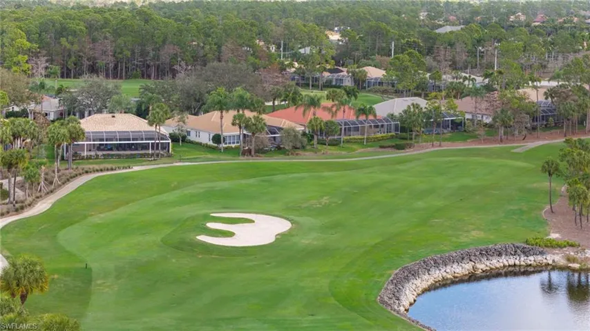 View of property's community with a residential view, golf course view, and a water view