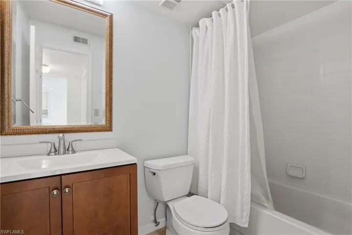 Full bath with vanity and shower / tub combo