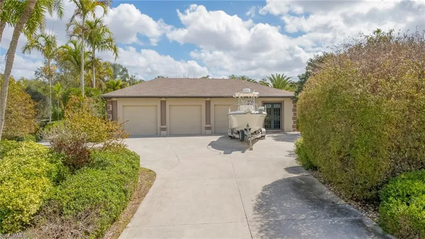Single story home with stucco siding, concrete driveway, an attached garage, and roof with shingles
