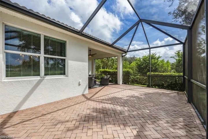 View of patio with a covered area lanai, and a ceiling fan