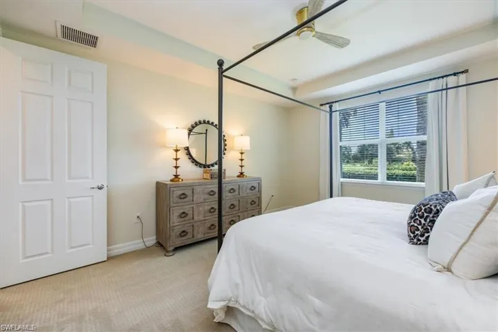 Bedroom featuring carpet flooring and a ceiling fan