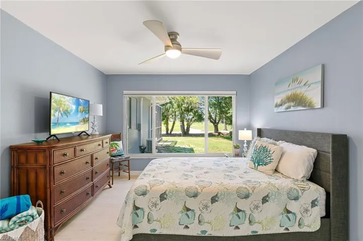 Bedroom featuring a ceiling fan and light wood-style floors