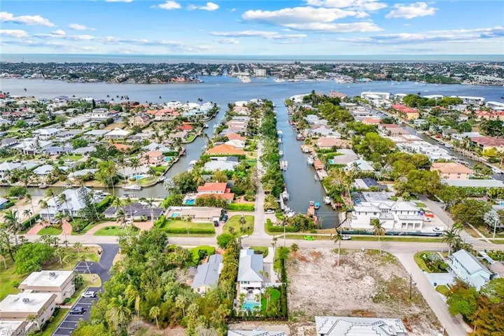Aerial view with a residential view and a water view