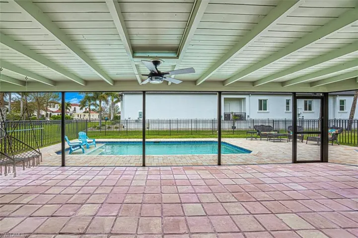 View of swimming pool featuring a fenced in pool, a patio area, and a fenced backyard