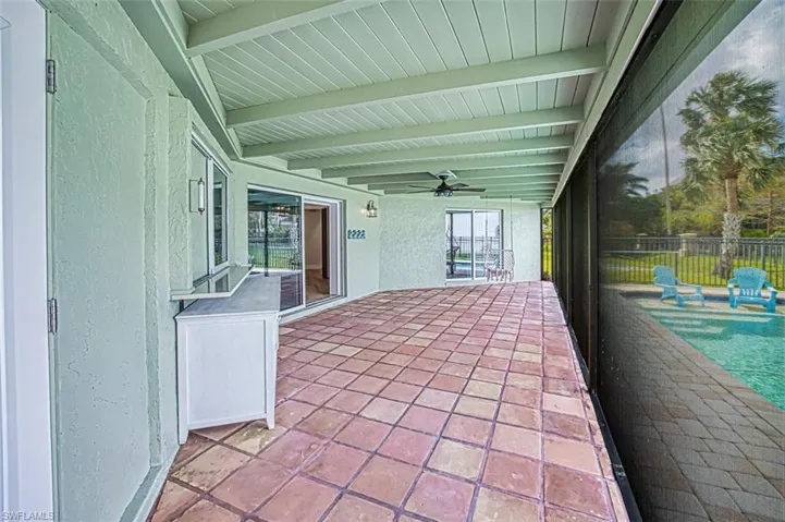 View of patio / terrace featuring ceiling fan and fence