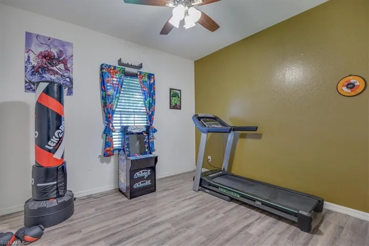Bedroom w/ LVP flooring