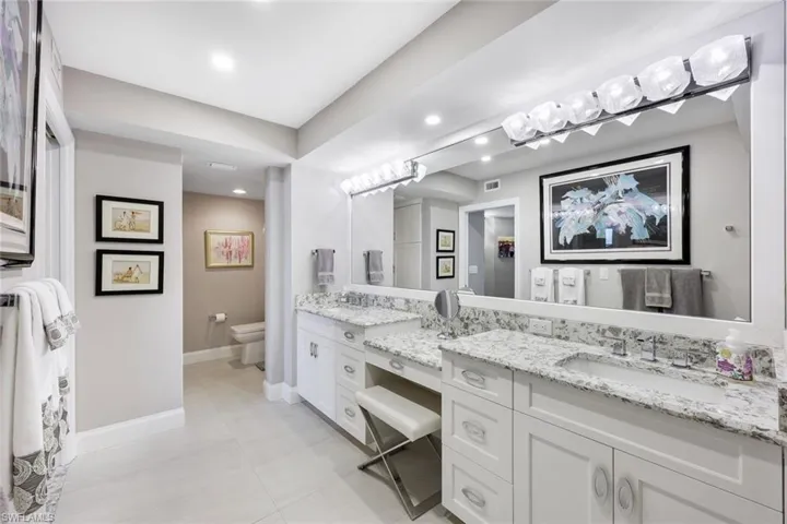 Dual sinks with vanity area. Storage galore!
