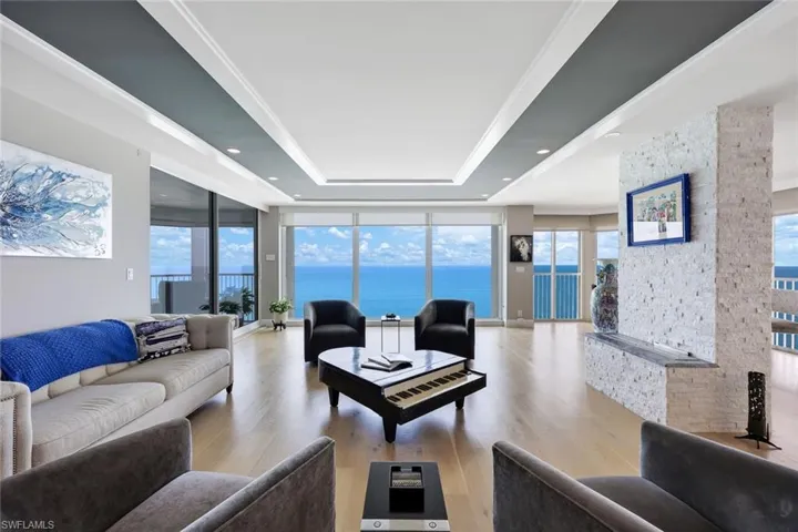 Views everywhere you look! Stacked stone fireplace, and custom millwork and lighting are found on the Great room ceiling