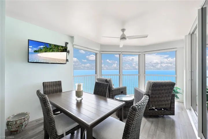 Screened balcony with views to Naples Pier and to the west.