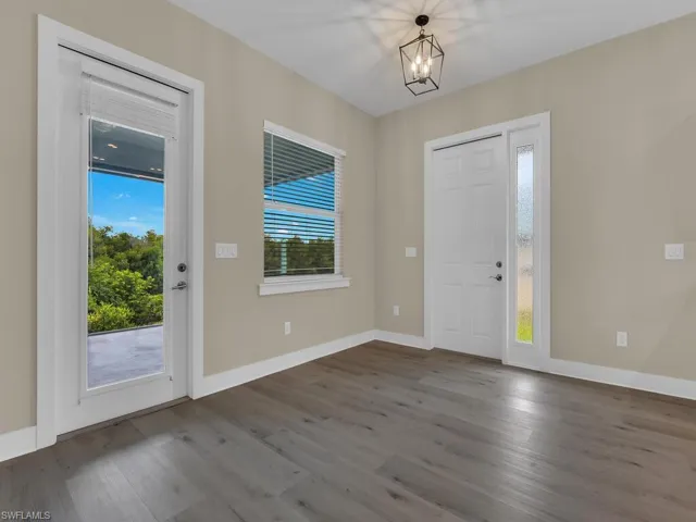 Master bedroom featuring fan and light