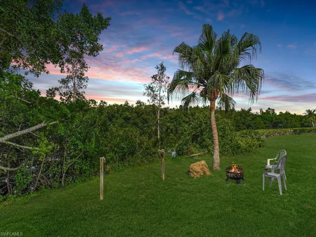 View of yard at dusk