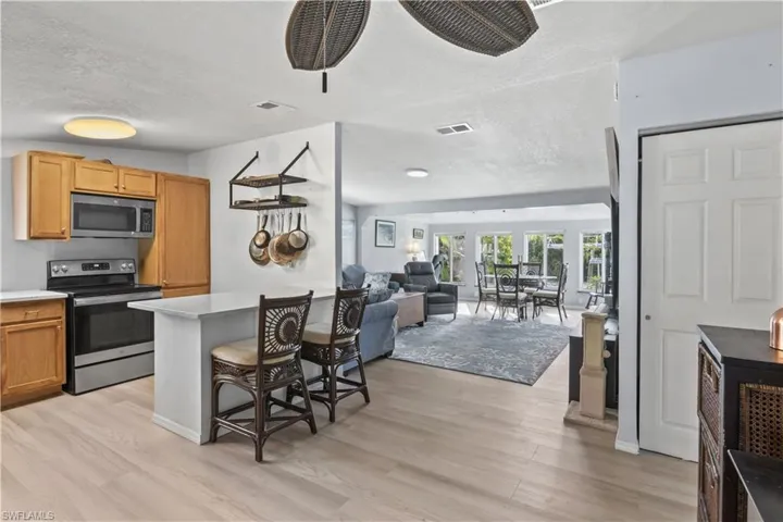 Featuring 2 bedrooms and 2 bathrooms, this MOVE-IN READY home sits along a peaceful canal with a private dock