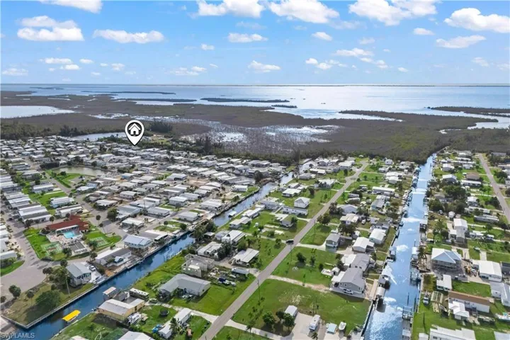 Experience the BEST of SWFL PARADISE living at 7150 Cobiac Dr in beautiful St. James City!