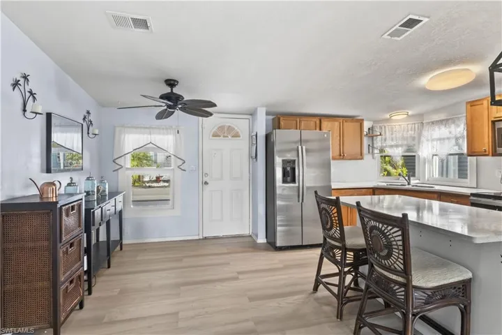 Featuring 2 bedrooms and 2 bathrooms, this MOVE-IN READY home sits along a peaceful canal with a private dock