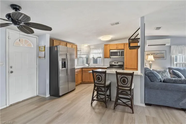 Featuring 2 bedrooms and 2 bathrooms, this MOVE-IN READY home sits along a peaceful canal with a private dock