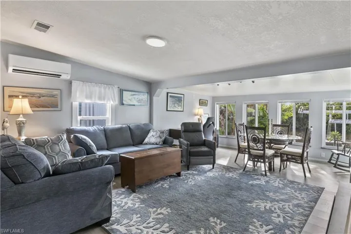 Featuring 2 bedrooms and 2 bathrooms, this MOVE-IN READY home sits along a peaceful canal with a private dock