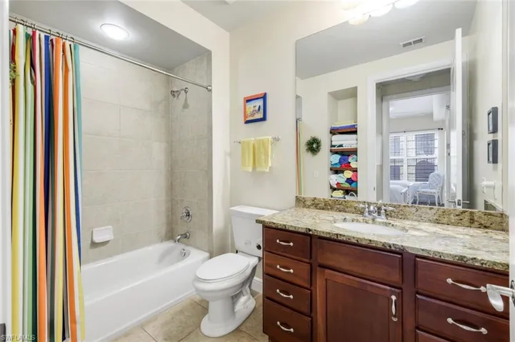 Guest Bathroom with linen shelves