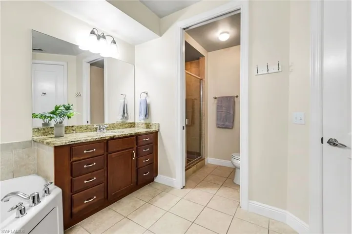 Primary Bathroom with shower and tub