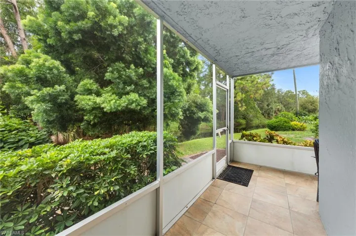 Wrap around Lanai with view of the landscaped canal