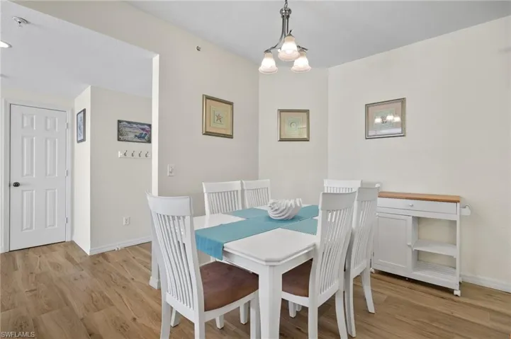 Dining Area Next To Kitchen - Virtually Enhanced Photo