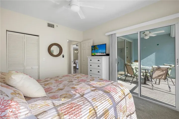 Guest Room and Slider To Lanai - Virtually Enhanced Photo