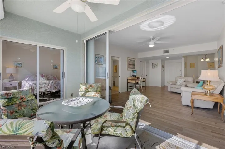 From Lanai into Living Area / Entry - Virtually Enhanced Photo