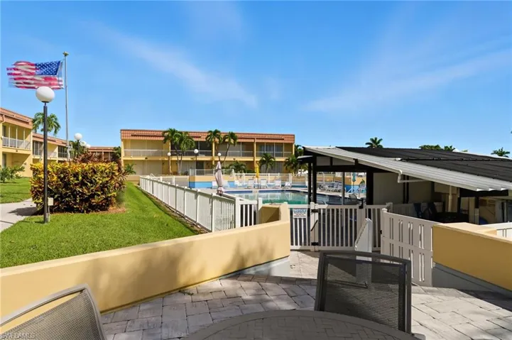 Community pool featuring a patio area