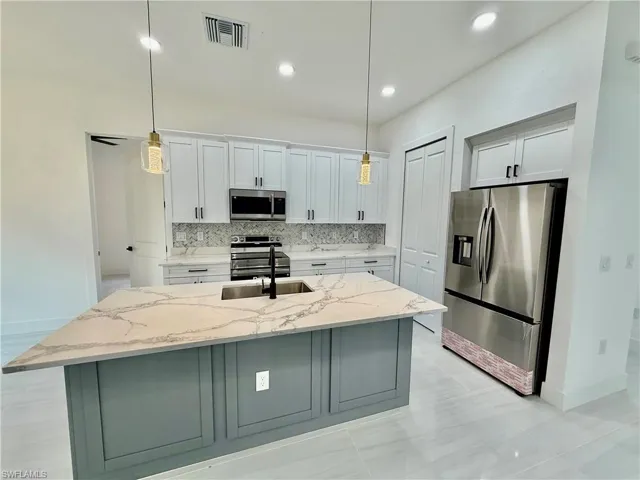 17  Wellington  AVE, Lehigh Acres, FL 33936