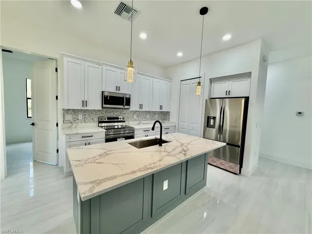 17  Wellington  AVE, Lehigh Acres, FL 33936