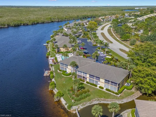 Aerial overview of property's location featuring a large body of water