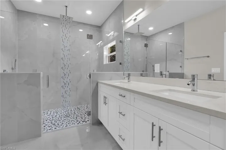 The Master Bath Comes With Dual Sinks, Glass Enclosed Shower, And Soft Touch Cabinets & Drawers!