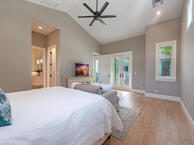French doors opening to the pool and outdoor entertaining/relaxation