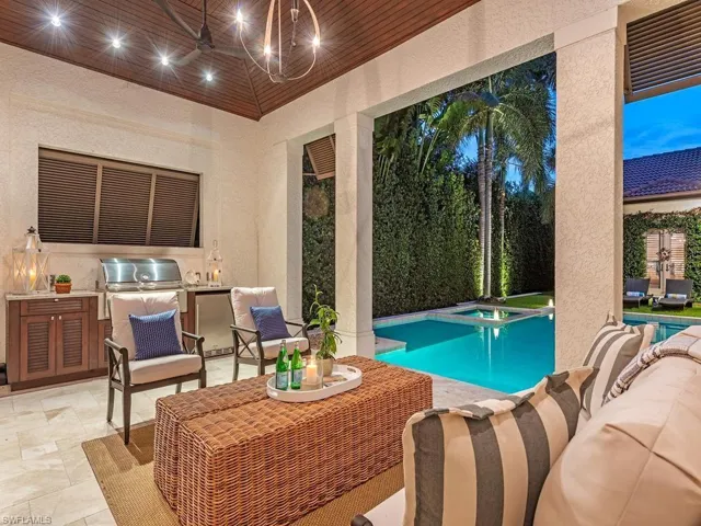 Outdoor living with sink, grill and refrigerator
