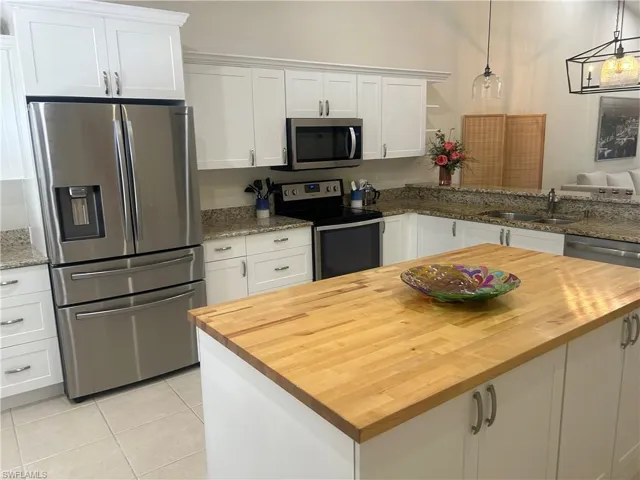 Kitchen with island and even more storage